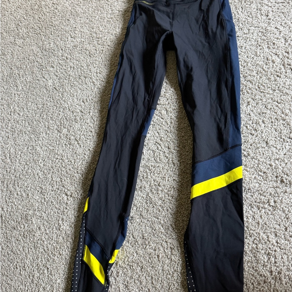 lululemon athletica Black and Yellow limited addition Leggings size 4, 28”